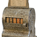 Caille Bros. 'Globe' Poker Hand 5-reel card machine, circa 1906, cast-iron case, sold for $85,000 not including the buyer's premium. Image courtesy Victorian Casino Antiques.