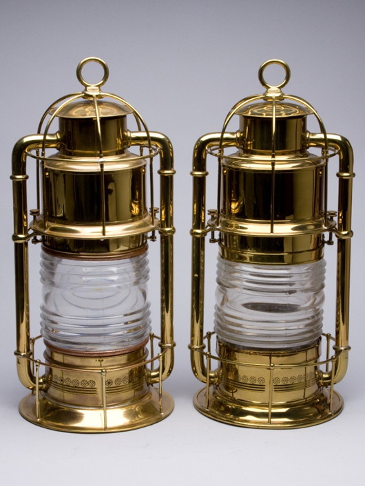 Pair of polished brass cold blast tubular signal marine lanterns, 25 3/4 inches tall each (April 29 sale, $2,185), Lot 641). Image courtesy Jeffrey S. Evans & Associates.