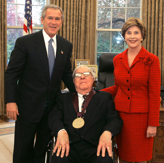 Ray Bradbury (center) with President George W. Bush and Laura Bush, after receiving the 2004 National Medal of Arts Award at the White House. Photo by Susan Sterner.