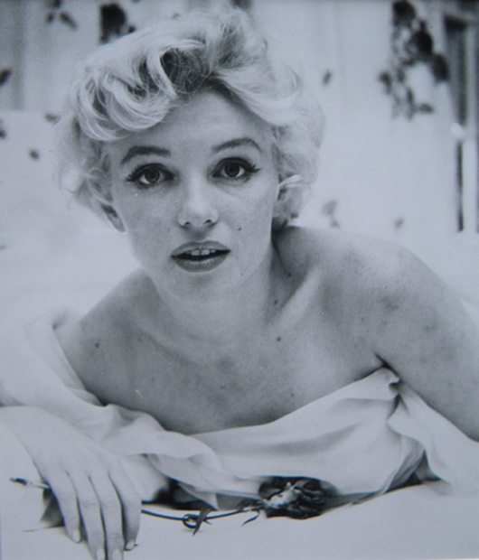 Marilyn Monroe untouched photo by Milton Greene. Outer Cape Auctions image.