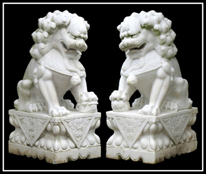 Pair Chinese carved marble foo dogs. William Jenack Estate Appraisers and Auctioneers image.