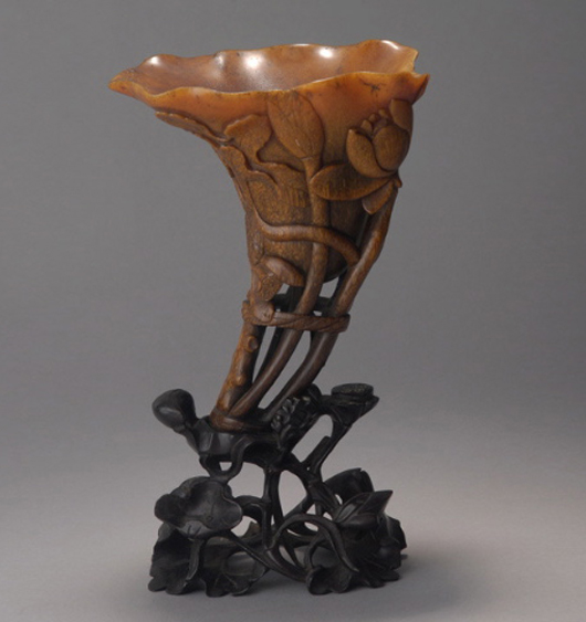 Finely carved rhinoceros horn ‘lotus' libation cup, 17th-18th century. Estimate: $40,000-$60,000. Michaan’s Auctions image.   