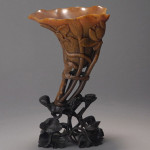 Finely carved rhinoceros horn ‘lotus' libation cup, 17th-18th century. Estimate: $40,000-$60,000. Michaan’s Auctions image.