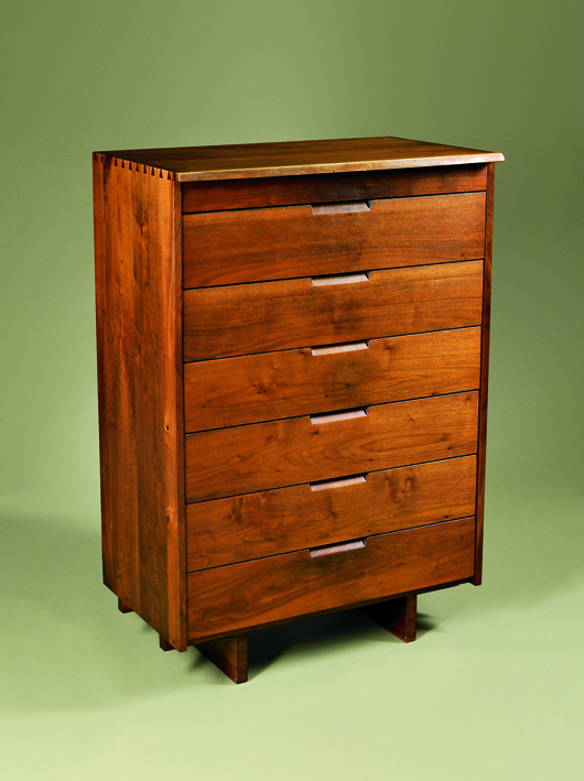 George Nakashima (1905-1990) tall chest of drawers, walnut, New Hope, Pa., 1967, 53 inches high, 36 inches wide, 21 1/2 inches deep. Skinner Inc. image.