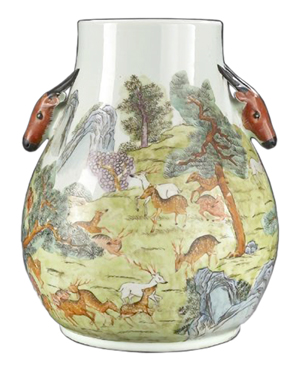 This famille rose Hundred Deer vase was made in the 20th century but appears to be older. It is worth close to $2,000. The deer represented by the antlered deer-head handles and in the decorative scene are from a breed native to China. They look very different from deer native to the United States. New Orleans Auction Galleries image.