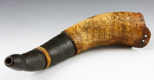Powder horn engraved with map, 14 inches long. Price realized: $3,160. Kaminski Auctions image.
