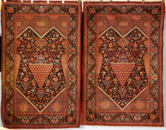 Two Persian Keshan rugs, 4 feet 3 inches x 7 feet 1 inch. Price realized: $7,605. Kaminski Auctions image.