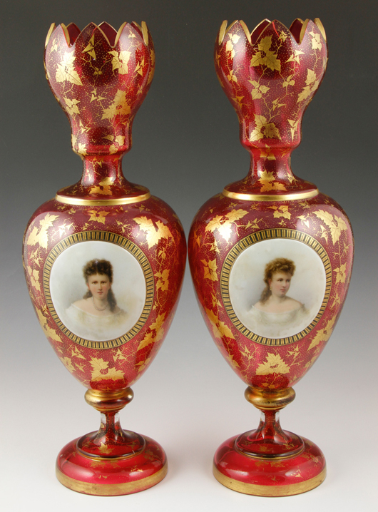Pair of Bohemian cranberry cut glass vases with painted oval portrait panels. Priced realized: $2,050. Kaminski Auctions image. 