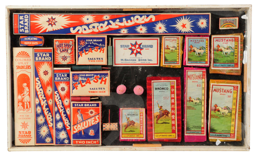 Top lot of the sale: salesman’s sample board containing 20 sample sparklers, caps and firecracker packs, $7,200. Morphy Auctions image.