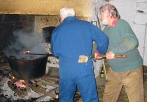 The traditional method of making apple butter includes the use of large copper kettles over an open fire, as seen in this image. The kettle shown here is similar to six antique copper kettles that were stolen from a Darlington, Pa., church and taken to a scrap metal dealer.