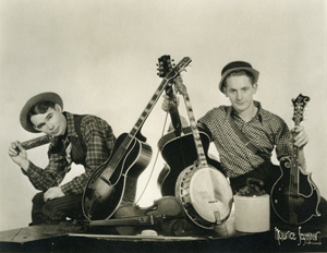 1930s photo of Les Paul (right) and fellow musician Sunny Joe Wolverton with a selection of instruments that includes Paul's two famed L5 guitars. Photo courtesy of the Waukesha County Museum.