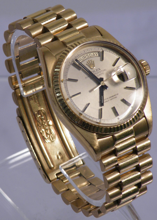 Rolex 18-karat gold day-date man's watch. Blue Moon Coins image.