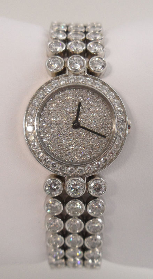Harry Winston platinum ladies wristwatch with 17.10 carats of round brilliant-cut diamonds, replacement value $238,600. Estimate $60,000-$80,000. Image courtesy of Bruce Kodner Galleries. 