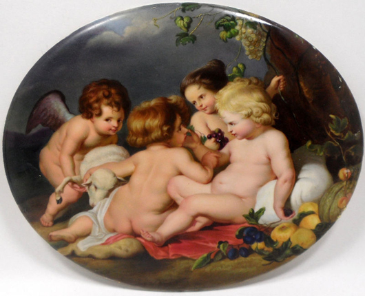 KPM oval porcelain plaque depicting cherub with lamb and babies, 11 x 8 1/2 inches, est. $2,800-$3,000. Image courtesy of Bruce Kodner Galleries.