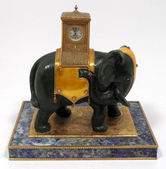 Art Nouveau carved-jade elephant with yellow enamel and diamonds on bronze-mounted lapis-base desk clock. Estimate $2,500-$3,000. Image courtesy of Bruce Kodner Galleries.