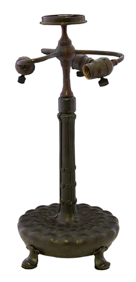 Early 20th century Tiffany bronze lamp base, 20 3/4 inches tall, #7811, impressed ‘Tiffany Studios.’ Crescent City Auction Gallery image.