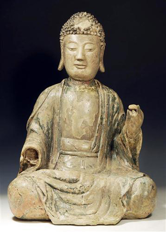 Important Chinese stucco polychrome seated Buddha, Yuan to Ming Dynasty, circa 14th to 16th century A.D. Estimate: $7,000-$10,000. Antiquities-Saleroom image.