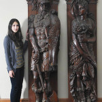 Pair of American figural carved oak pilasters depicting Mars, the Roman god of war, together with Venus, 86 inches tall. Estimate: $10,000-$15,000. Fairfield Auction image.