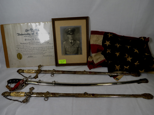 Selection of militaria including historical swords. Image courtesy of Carstens Galleries.