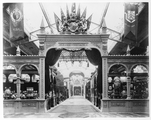 A period photograph of the entrance to Great Britain’s display at the 1889 Paris Exposition Universelle illustrates how decorative arts were presented to the public. New design trends were set, as both private buyers and institutions purchased objects that caught their fancy. 