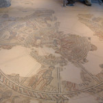 A mosaic floor in a sixth century synagogue in Israel pictures the zodiac. Image courtesy Wikimedia Commons.