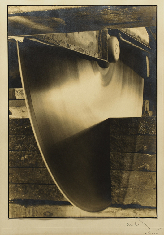 One of Margaret Bourke White’s iconic images of 20th century American industry, this gelatin silver print labeled 'Diamond Edge Saw, Indiana Limestone Company' sold within estimate at $12,760. Case Antiques image.