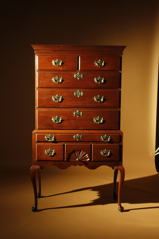 Queen Anne walnut high chest of drawers featuring a fan carved drawer, scrolled apron and tall cabriole legs. Coastal Massachusetts, likely Boston or Salem, 1770-1795. Courtesy Nathan Liverant & Son.