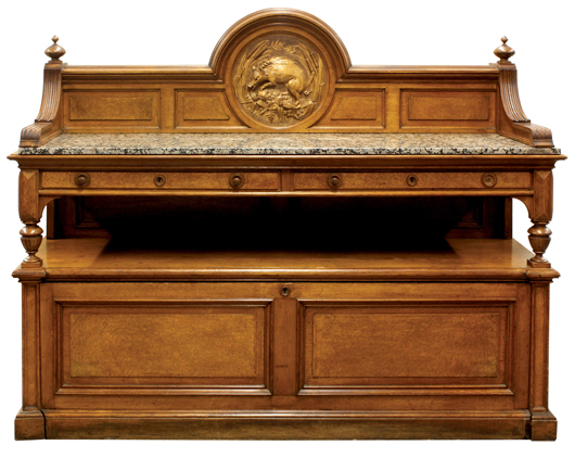 The marble-top sideboard to the Pottier & Stymus dining suite stores the leaves to the table. The set sold for $23,7000. Clars Auction Gallery Image.