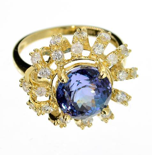 14K gold, 4.46-carat round-cut tanzanite and diamond ring, est. $12,027-$24,054. Government Auction image.