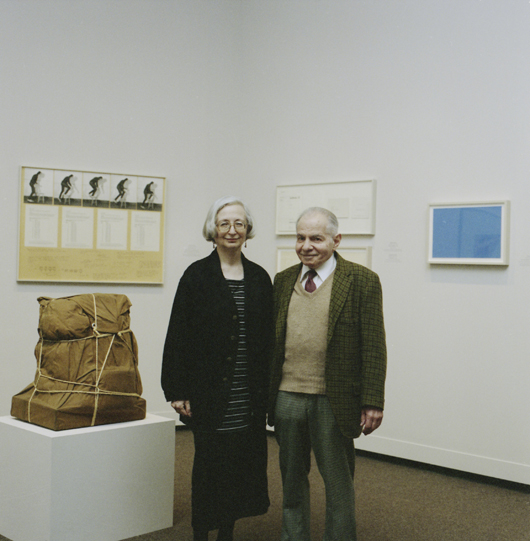 Dorothy and Herbert Vogel in the 1994 exhibition 'From Minimal to Conceptual Art: Works from the Dorothy and Herbert Vogel Collection at the National Gallery of Art.' Photo by John Tsantes. National Gallery of Art, Washington, D.C., Gallery Archives.
