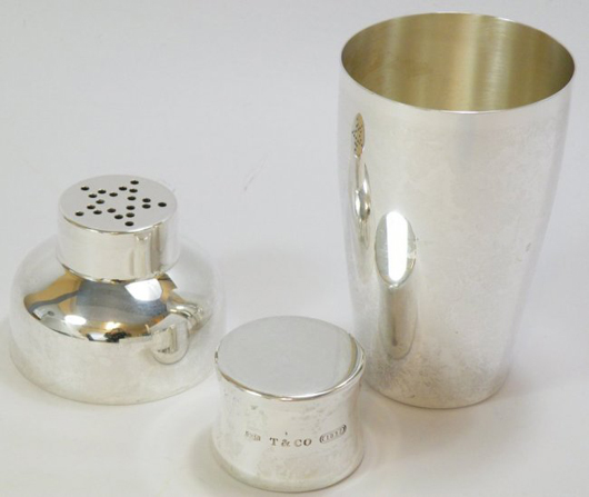 Rare 1837 Tiffany & Co. sterling silver cocktail shaker, 8 in., 12.605 ozt., originally part of a set. Marked on lid ‘925, T& CO 1837’ and 'Tiffany & Co .925 Sterling.' Estimate $1,200-$1,500. Blue Moon Coins image.