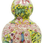 Chinese Qing Dynasty Famille Rose enameled double gourd hulu form vase, 4 3/4 inches tall. Elite Decorative Arts image.