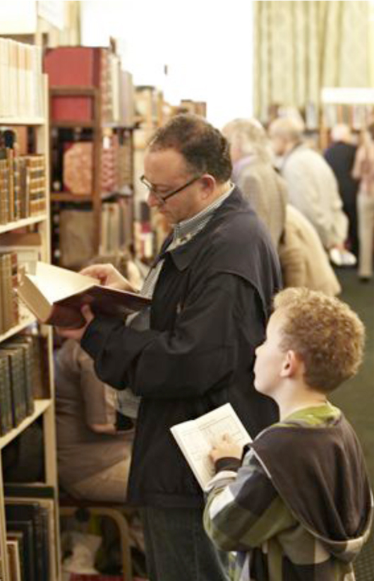Customers at a Chelsea Antiquarian Book Fair. Chelsea Antiquarian Book Fair image.