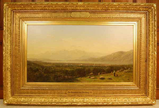 ‘The Adirondacks from Ferrisburg, Vt.,’ by J.B. Bristol, overall size 41 3/4 x 61 3/4 inches in the original frame. Estimate: $50,000-$75,000. Blanchard’s Auction Service image.