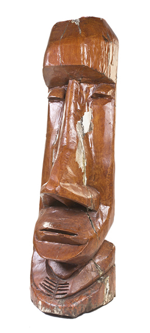 Carved wood Easter Island-style tiki head. Estimate: $1,000-$2,000. Leslie Hindman Auctioneers image.
