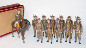 Pfeiffer composition U.S. mounted officer and infantrymen, 90mm, original box, $4,920. Old Toy Soldier Auctions image.