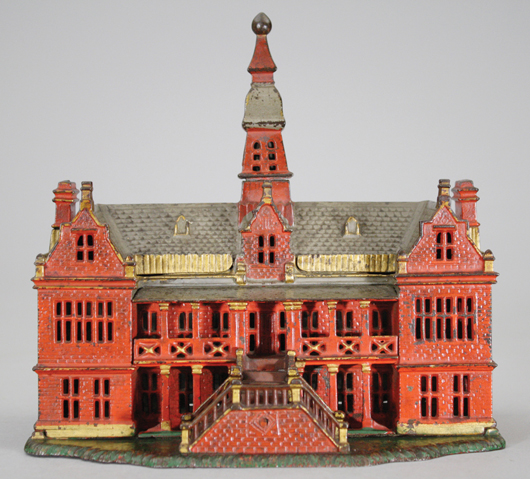 Ives, Blakeslee cast-iron Red Palace still bank, $19,600. RSL Auction Co. image.
