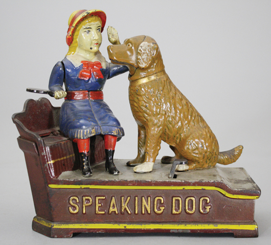J. & E. Stevens 'Speaking Dog' cast-iron mechanical bank, blue-dress version, $14,700. RSL Auction Co. image.