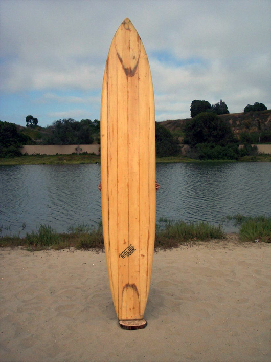 Authentic 1950s Bob Simmons balsa surfboard, wood fin, square tail. Authenticated by John Elwell as being a reshaped Simmons surfboard. Estimate: $10,000-$12,000. Waverider Auctions image.