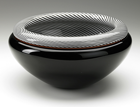 A strikingly simple black and white glass bowl, Effetre 1986, sold in February at Rago for $5,313. 