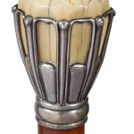 Signed Tiffany & Co. ivory and sterling silver cane, circa 1902-1907. Handle unscrews from a threaded orangewood shaft and horn ferrule. Kimball M. Sterling image.