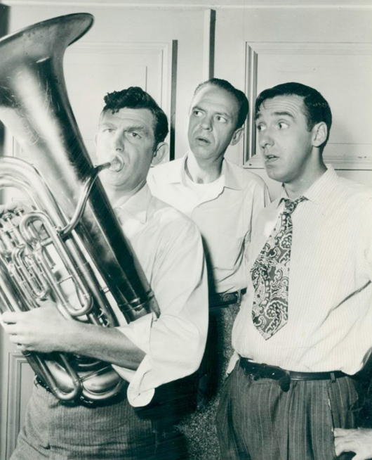 The fictional town of 'Mayberry,' setting for 'The Andy Griffith Show,' is believed to have been based on Andy Griffith's hometown of Mount Airy, N.C. In this 1963 TV show publicity picture, Griffith, who played Sheriff Andy Taylor, is pictured at left. Also shown are two other pivotal characters from the show: Deputy Barney Fife (played by Don Knotts, center) and Gomer Pyle (played by Jim Nabors, right).
