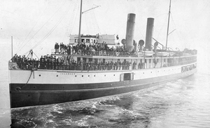 Historic photo of Steamship Islander of the Canadian Pacific Navigation Co. leaving Vancouver, BC for Skagway Bay in 1897. Photo by Thomas McNabb Jones. Source: Library and Archives of Canada. Public domain image in the USA.