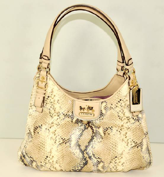 Authentic top of the line Coach brand python-skin handbag, est. $900-$1,800. Government Auctions image.
