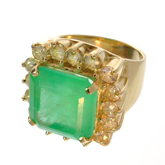 18K gold ring set with 13-carat emerald and 2 carats of diamonds, est. $19,450-$38,900. Government Auctions image.