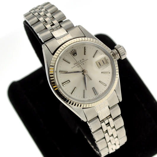 Rolex women’s Oyster Perpetual Date stainless steel watch, est. $4,050-$8,100. Government Auctions image.
