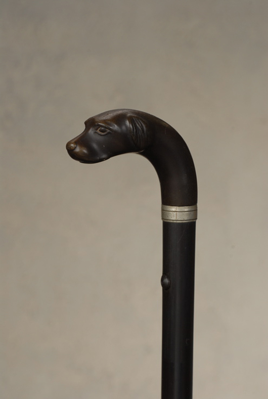 Scarce Remington small dog gun cane curio. Tradewinds Antiques image.