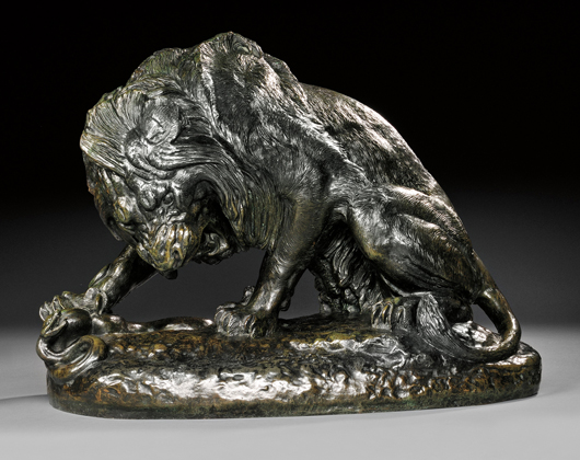 Antoine-Louis Barye (French, 1796-1875), bronze ‘Lion au serpent (Salon de 1833),’ 15 1/2 x 20 1/2 x 11 inches. Estimate: $10,000-$15,000. Skinner Inc. image.