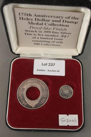 A limited edition reproduction of an Australian Holey Dollar and Dump. Image courtesy LiveAuctioneers.com Archive and Aalders Auctions.