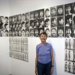 Artist Athena Tacha in front of her conceptual photographic work '36 Years of Aging' (1972-2008). Image courtesy Wikimedia Commons.